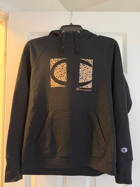 Champion Black Hoodie with Leopard-Print Logo